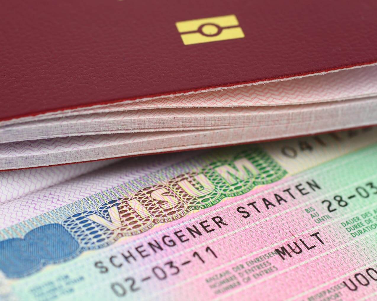 red passport opened visa page